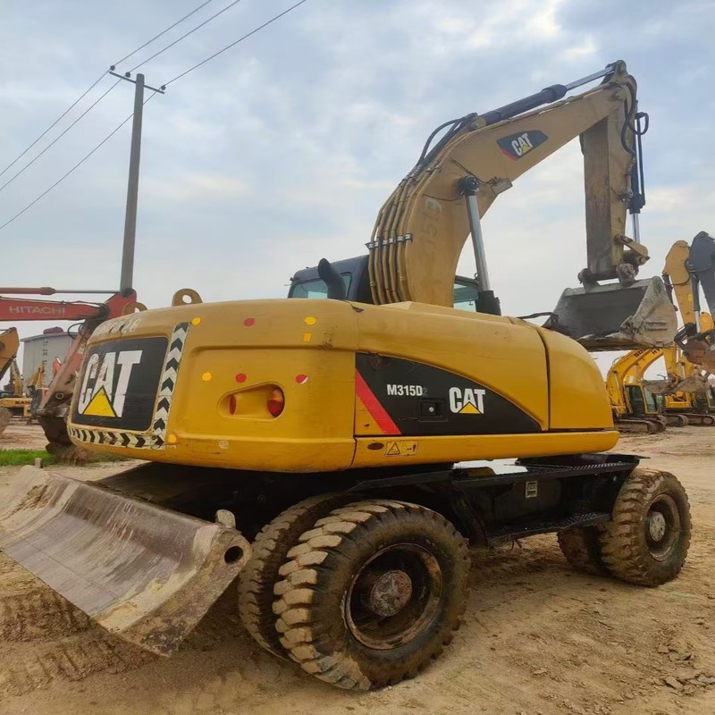 Excavadora de segunda mano original Cat M315D Excavadora de ruedas de 15 toneladas usada con cubo de 0,61m3