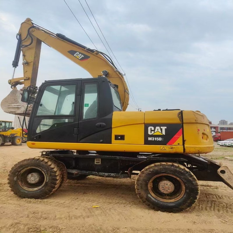 Excavadora de segunda mano original Cat M315D Excavadora de ruedas de 15 toneladas usada con cubo de 0,61m3